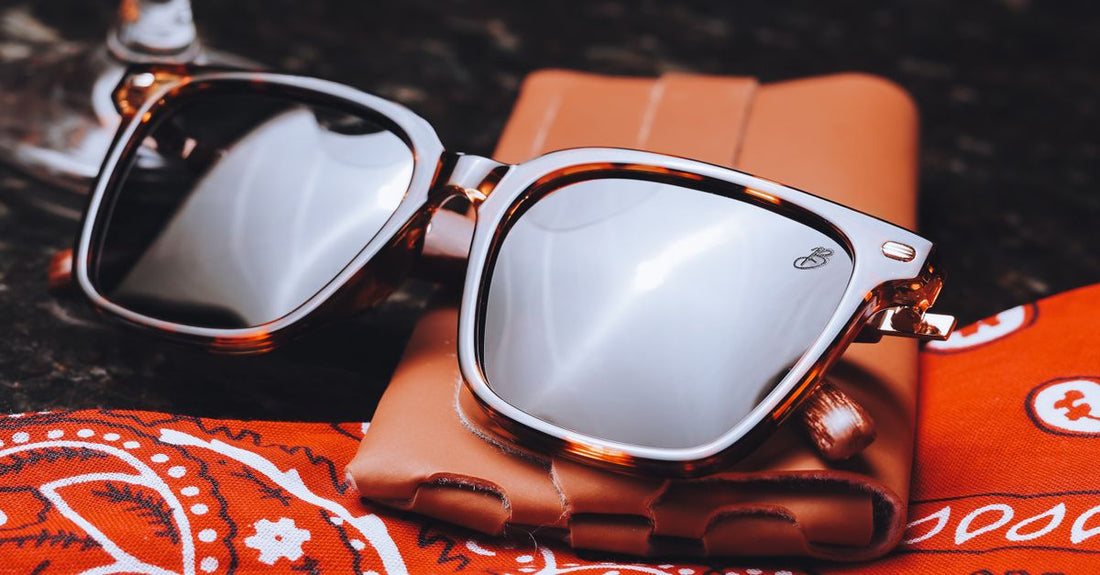 90s Mirrored Sunglasses: The Iridium Lens Revolution - mirrored chrome lens sunglasses, reflective silver sunglasses closeup,