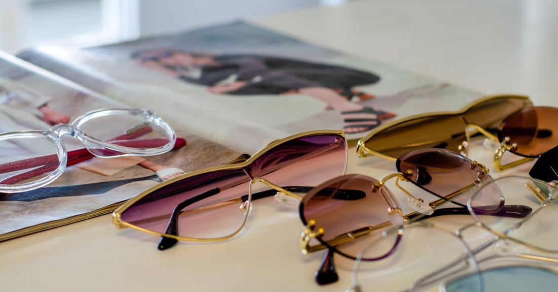 90s Sunglasses for Every Face Shape: Your Style Guide - assorted retro sunglasses frames flat lay variety