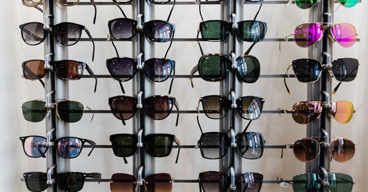 90s Sunglasses Brands That Defined the Decade - vintage sunglasses collection multiple frames display retro